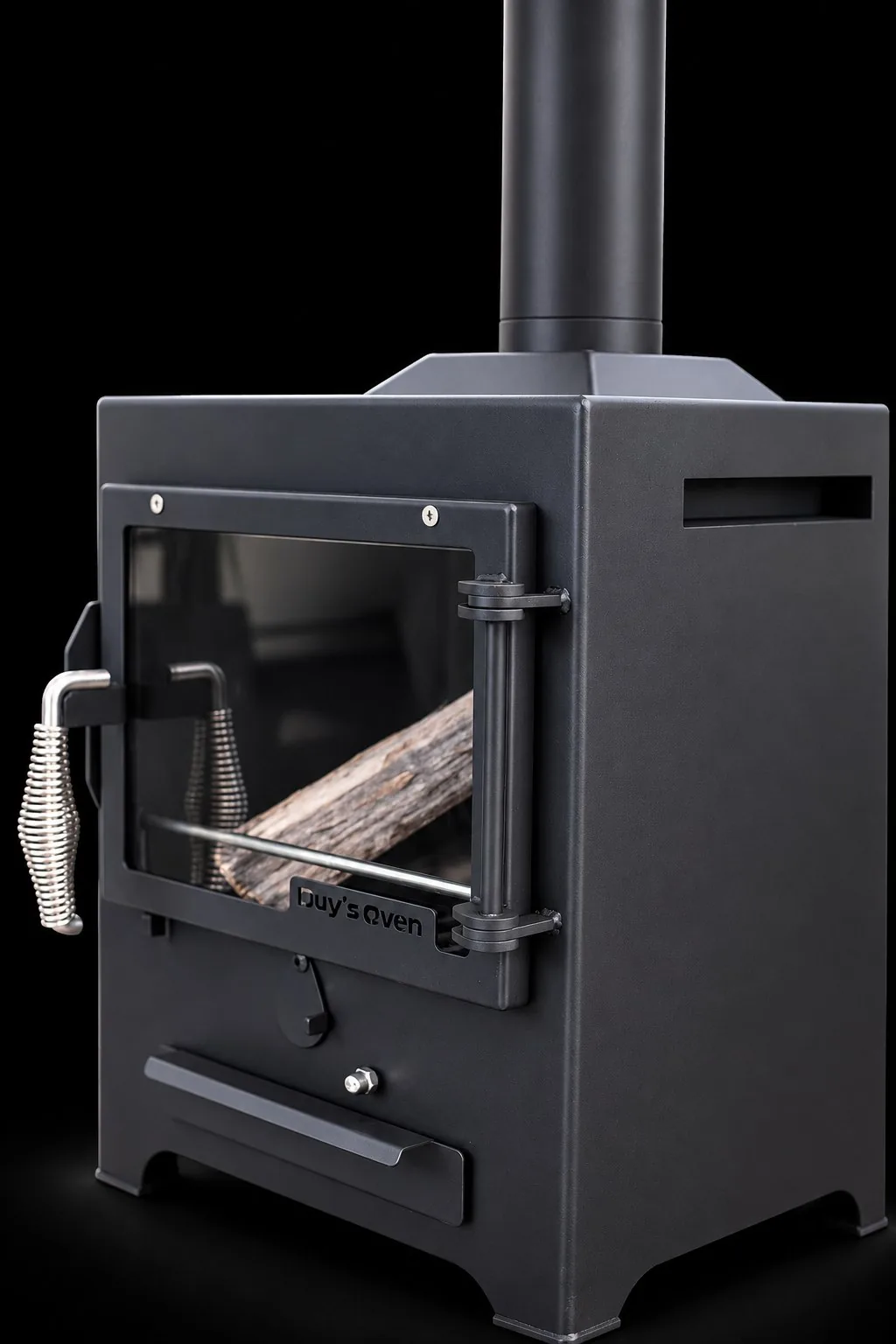 Cận cửa kính FirePlace Compact có chữ Duy's Oven, khay tro bên dưới